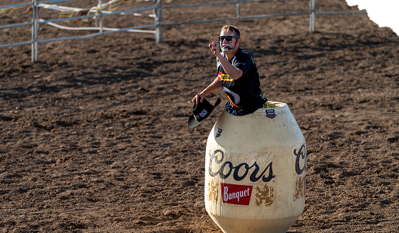 Rodeo clown in a Coors barrel