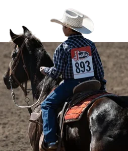 A young Calf Touch competitor on horseback